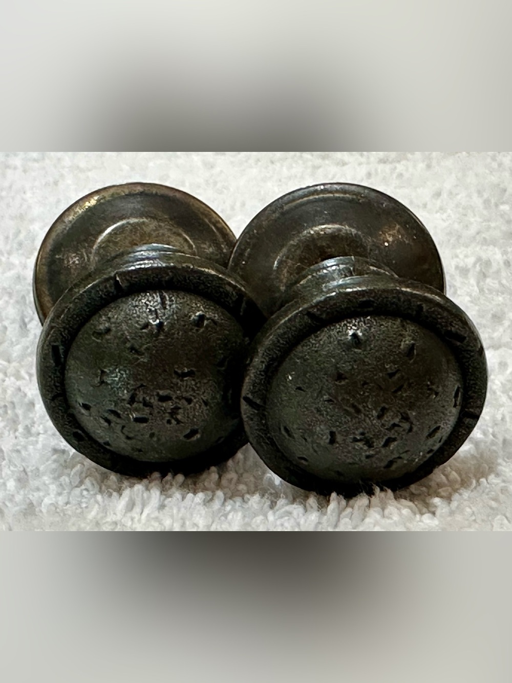 Pair (2) Round cabinet or drawer pulls. Distressed aged very dark brown w/covers
